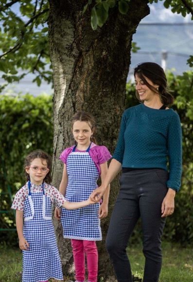 His wife Anna with their daughters Alma and Linda